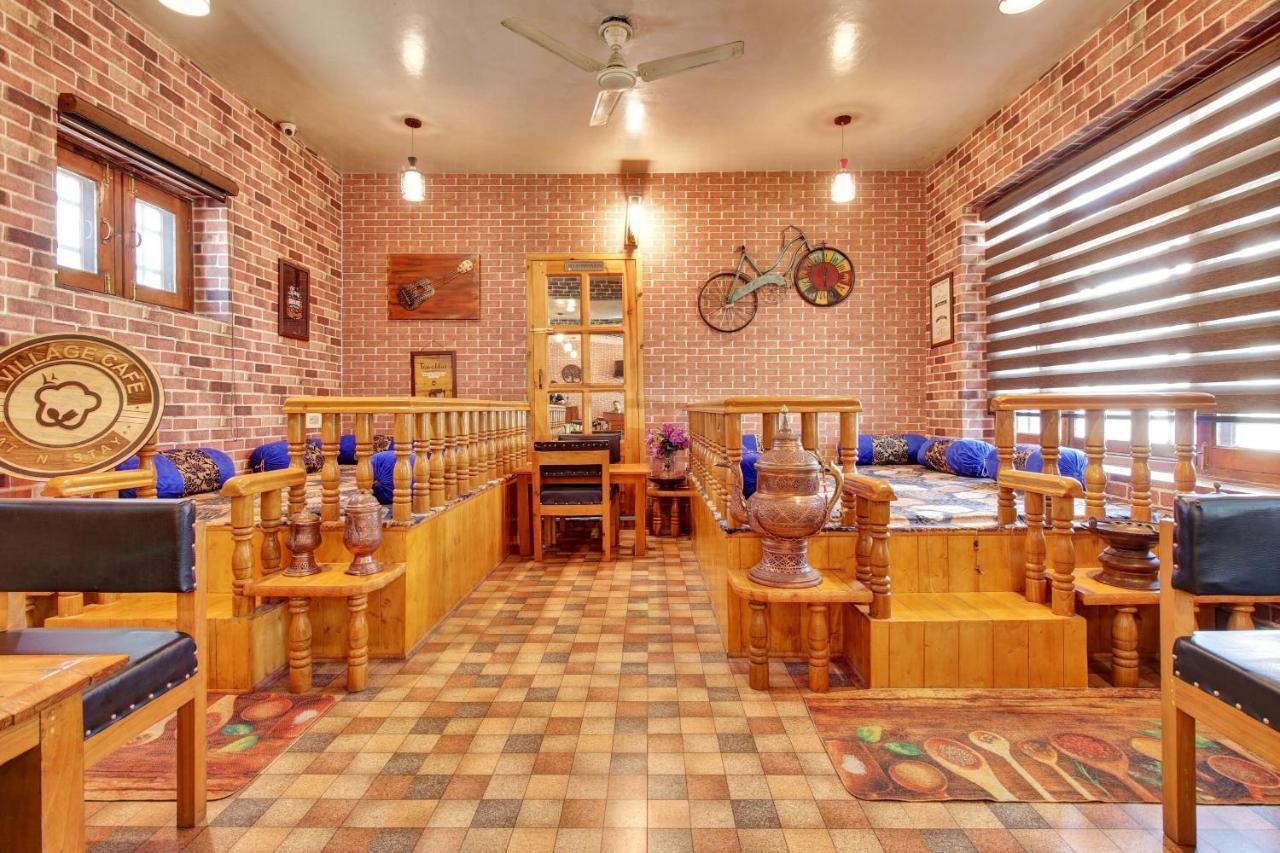 Super Oyo Capital O 91600 The Village Classic Hotel And Restaurant Сринагар Экстерьер фото